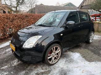 krockskadad bil auto Suzuki Swift 1.3 AIRCO 5DRS SPORTVELGEN 2010/3