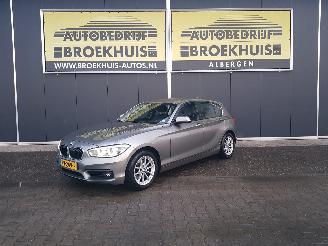 damaged passenger cars BMW 1-serie 120i High Executive 2017/4