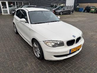 Damaged car BMW 1-serie 116i Corporate airco 2009/3