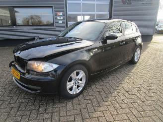 skadebil auto BMW 1-serie 118D High Executive 2009/6