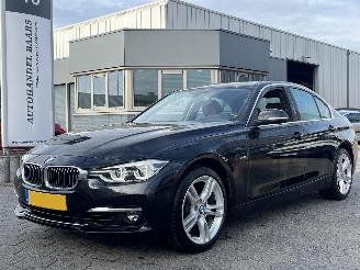Damaged car BMW 3-serie 320i High Executive AUTOMAAT 2017/9