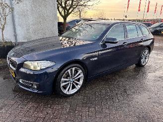 Schadeauto BMW 5-serie 528i x-drive luxury 2015/6