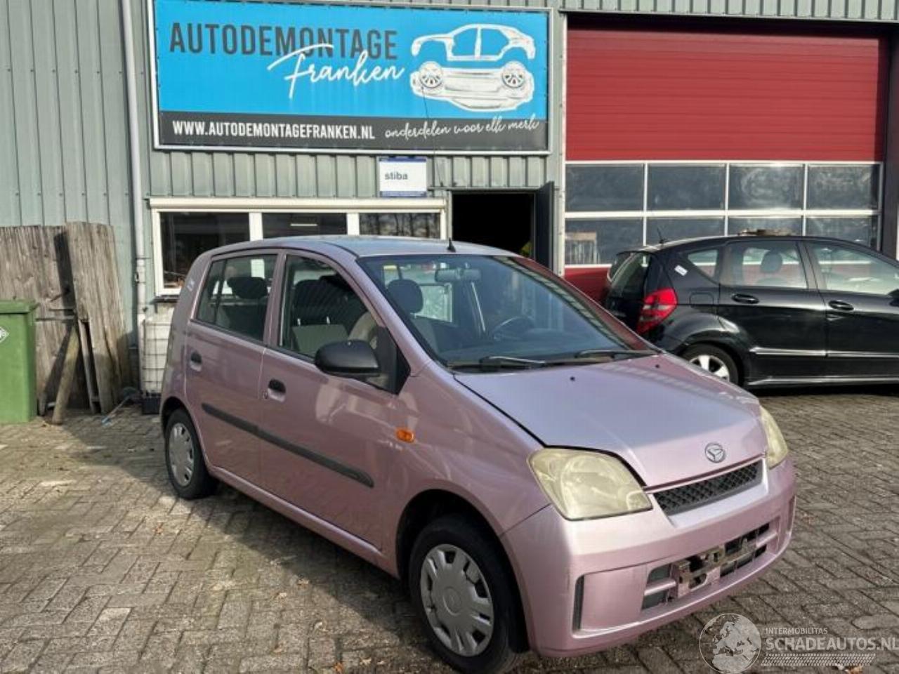 Daihatsu Cuore Cuore (L251/271/276), Hatchback, 2003 1.0 12V DVVT