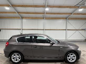 Unfallwagen BMW 1-serie 118d 100kW Airco Corporate Business Line 2009/1