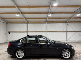 Schadeauto BMW 3-serie 320i 135kW Automaat Schuifkantel Luxury Edition 2018/4