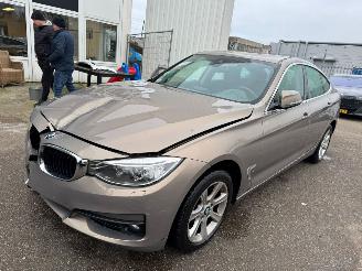 Coche accidentado BMW 3-serie Gran Turismo 320i Executive BJ 2014 202.816 KM 2014/1