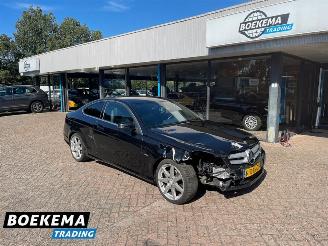 Vaurioauto  passenger cars Mercedes C-klasse 180 Coupe Facelift Navi H&K Clima Stoelverw. 2011/7