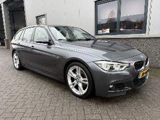 damaged passenger cars BMW 3-serie 320i M sport Touring Automaat 2016/2