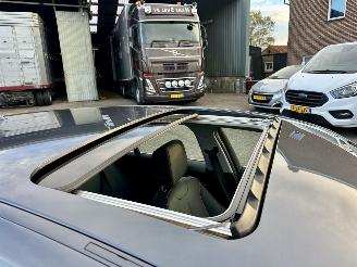 BMW 1-serie 118i 136pk 6-bak Cent Sportline 5drs - schuifdak - nap - leer - navi - stoelverw - licht + regensensor picture 9