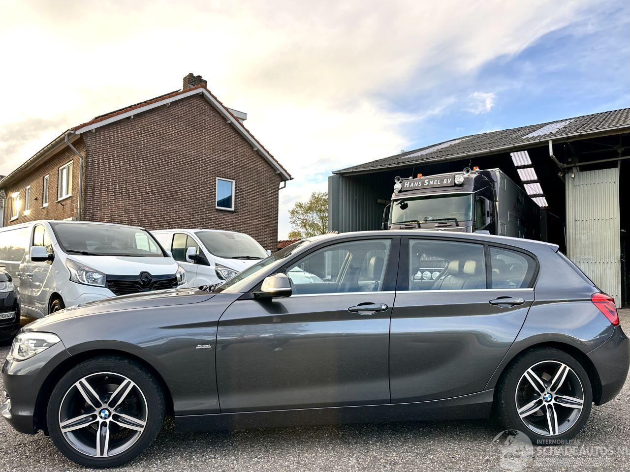 BMW 1-serie 118i 136pk 6-bak Cent Sportline 5drs - schuifdak - nap - leer - navi - stoelverw - licht + regensensor