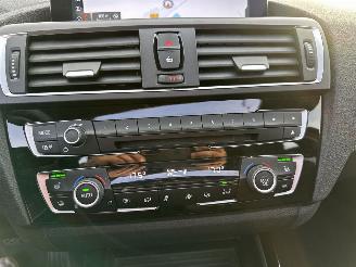 BMW 1-serie 118i 136pk 6-bak Cent Sportline 5drs - schuifdak - nap - leer - navi - stoelverw - licht + regensensor picture 21