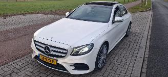 Vaurioauto  passenger cars Mercedes E-klasse E200 Aut. AMG-LINE  AmbientLight  HalfLeer Navi Pano/SchuifDak StoelVerwarming NL-AUTO Schadevrij 2016/7